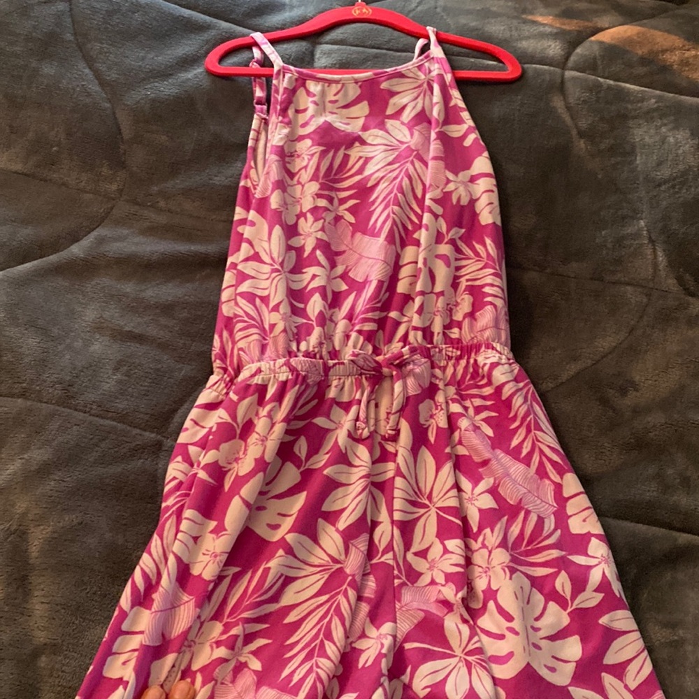 Summery girls purple romper with adjustable straps.